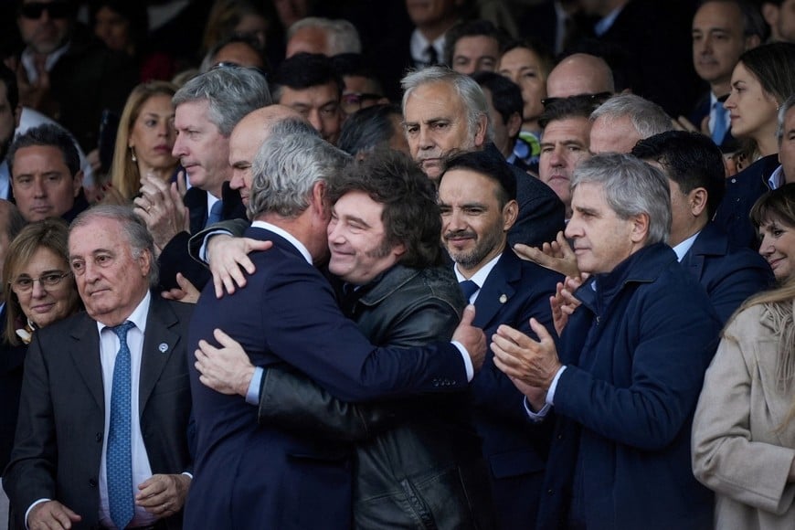 Argentina's President Javier Milei hugs President of the Argentine Rural Society (SRA), Nicolas Pino, during the society's 138th annual exhibition in Buenos Aires, Argentina, July 26, 2026. REUTERS/Mariana Nedelcu
