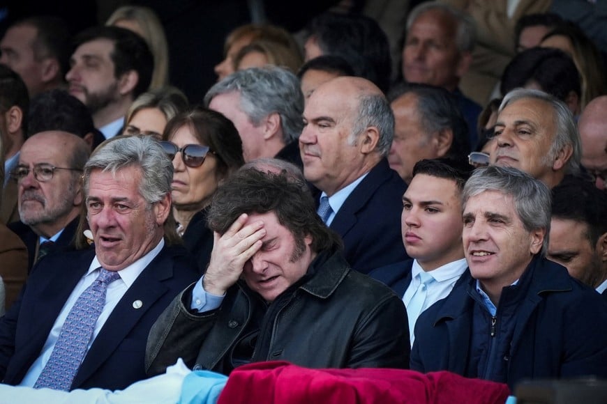 Argentina's President Javier Milei and President of the Argentine Rural Society (SRA), Nicolas Pino, react as they attend the society's 138th annual exhibition in Buenos Aires, Argentina, July 26, 2026. REUTERS/Mariana Nedelcu