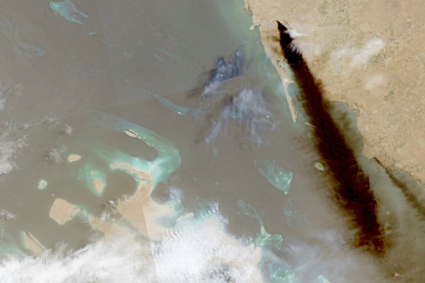 A composite satellite image shows trail of smoke rising, as Yemen's Iran-aligned Houthis said on Saturday, July 25, that they carried out operations targeting Saudi Aramco facilities in Jizan and Yanbu, according to a statement by the group's military spokesperson Yahya Sare, in Jazan province, Saudi Arabia, July 26, 2026. European Union/Copernicus Sentinel-2/Handout via REUTERS    THIS IMAGE HAS BEEN SUPPLIED BY A THIRD PARTY. MANDATORY CREDIT