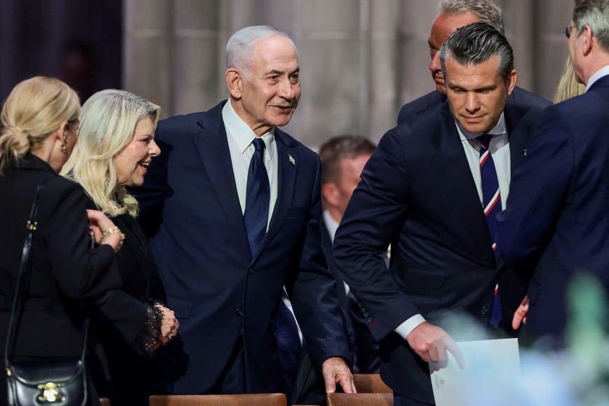 Israeli Prime Minister Benjamin Netanyahu with his wife Sara, U.S. Defense Secretary Pete Hegseth and other officials on the day of the funeral service for late U.S. Senator Lindsey Graham (R-SC) at Washington National Cathedral in Washington, D.C., U.S., July 28, 2026. REUTERS/Evelyn Hockstein