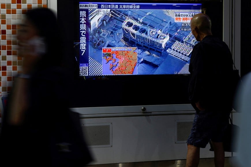 A person looks at a screen, showing damage after an earthquake with a preliminary magnitude of 7.1 struck Japan's southern Kumamoto Prefecture, in Tokyo, Japan, July 28, 2026. REUTERS/Manami Yamada?