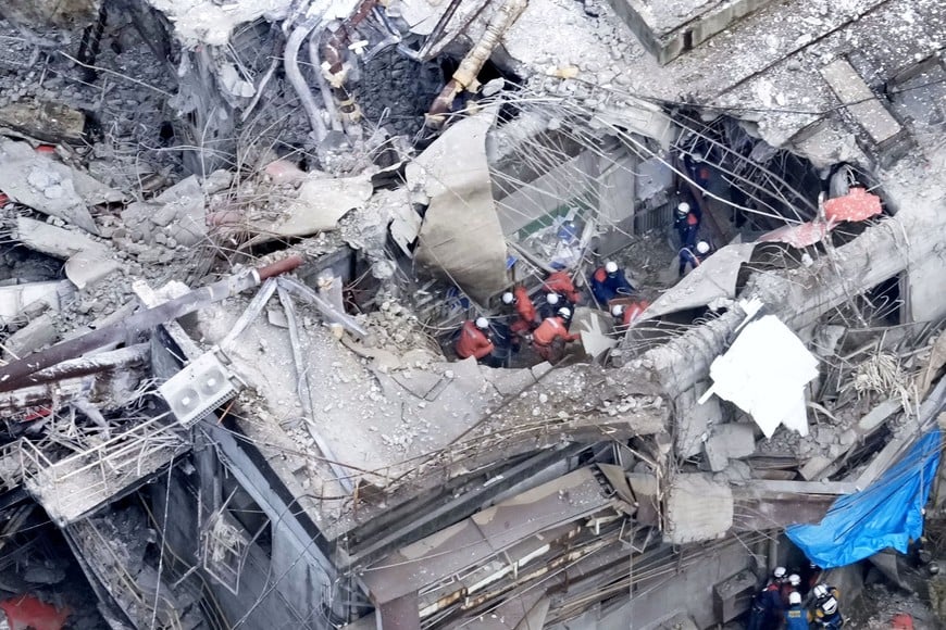 An aerial view shows rescue workers at Nippon Paper Industries factory after an earthquake with a preliminary magnitude of 7.1 struck Japan's southern Kumamoto prefecture, in Yatsushiro City, Kumamoto Prefecture, Japan, July 29, 2026. Kyodo/via REUTERS ATTENTION EDITORS - THIS IMAGE HAS BEEN SUPPLIED BY A THIRD PARTY. MANDATORY CREDIT. JAPAN OUT. NO COMMERCIAL OR EDITORIAL SALES IN JAPAN.