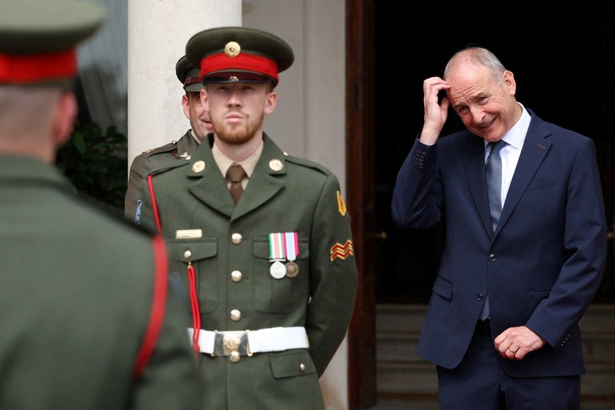 Ireland's Prime Minister (Taoiseach) Micheal Martin waits to greet German Chancellor Friedrich Merz at Farmleigh House ahead of a bilateral meeting, in Dublin, Ireland, July 28, 2026. REUTERS/Cathal McNaughton