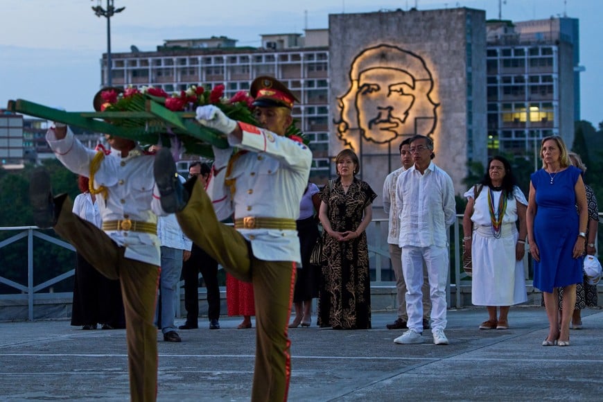 Backdropped by an image of Che Guevara, Colombia’s President Gustavo Petro, third right, attends a wreath-laying ceremony at the Jose Marti Monument during his official visit in Havana, Cuba, Friday, July 31, 2026. Ramon Espinosa/Pool via REUTERS