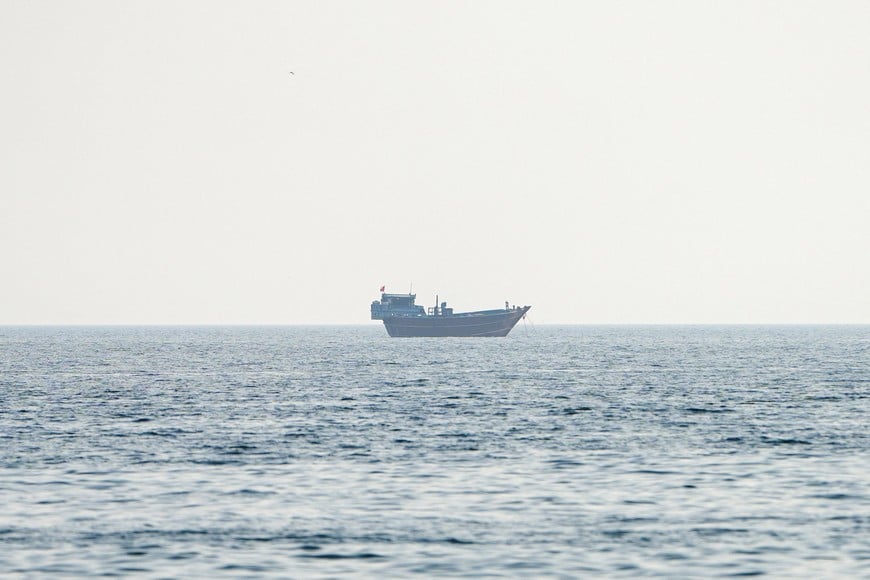 A vessel at the Strait of Hormuz, as seen from Musandam, Oman, July 23, 2026. REUTERS/Stringer