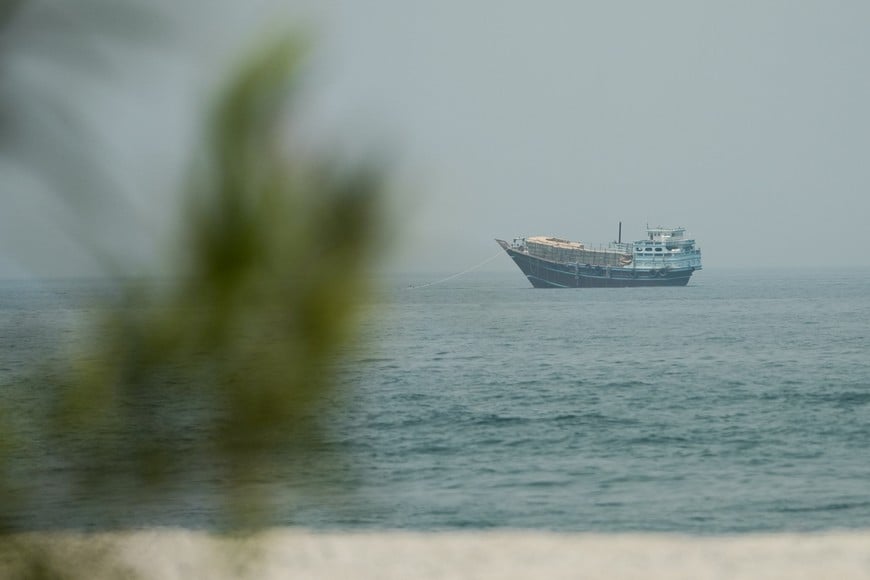 A vessel at the Strait of Hormuz, as seen from Musandam,Oman, July 14, 2026. REUTERS/Stringer