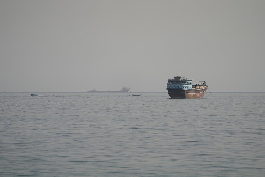 FILE PHOTO: Vessels in the Strait of Hormuz, as seen from Musandam, Oman, August 3, 2026. REUTERS/Stringer/File Photo