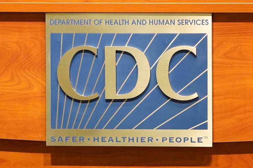 FILE PHOTO: A sign of the Centers for Disease Control and Prevention is seen on a podium during the meeting of the members of the Advisory Committee on Immunization Practices, in Atlanta, Georgia, U.S. June 25, 2025. REUTERS/Megan Varner/File Photo