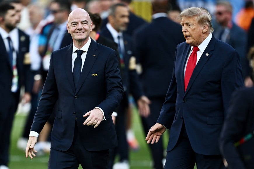 Soccer Football - FIFA World Cup 2026 - Final - Spain v Argentina - New York/New Jersey Stadium, East Rutherford, New Jersey, U.S. - July 19, 2026
U.S. President Donald Trump and FIFA President Gianni Infantino during the trophy presentation after the match REUTERS/Dylan Martinez