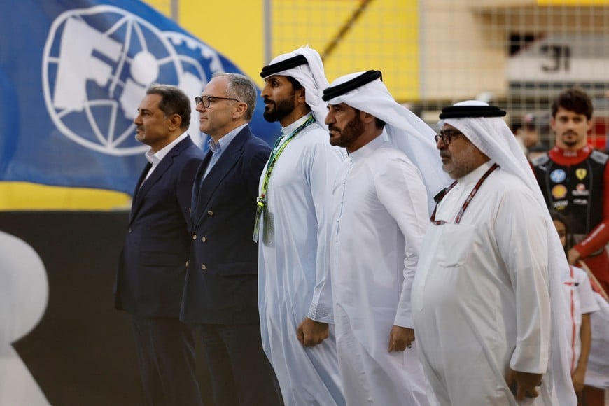 Formula One F1 - Bahrain Grand Prix - Bahrain International Circuit, Sakhir, Bahrain - April 13, 2025
F1 CEO Stefano Domenicali, FIA President Mohammed Ben Sulayem and Bahrain's Crown Prince and Prime Minister Salman bin Hamad Al Khalifa pose for a photograph ahead of the Bahrain Grand Prix REUTERS/Hamad I Mohammed