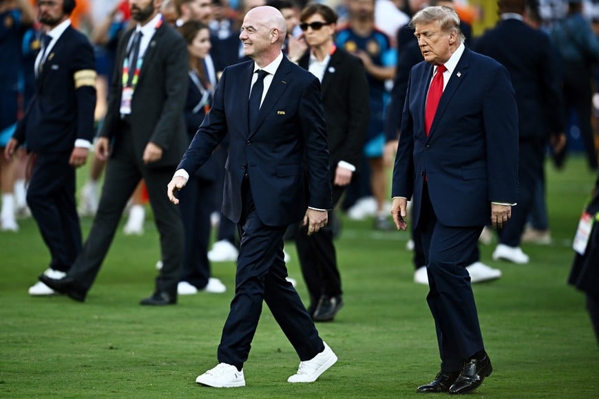 Soccer Football - FIFA World Cup 2026 - Final - Spain v Argentina - New York/New Jersey Stadium, East Rutherford, New Jersey, U.S. - July 19, 2026
U.S. President Donald Trump and FIFA President Gianni Infantino during the trophy presentation after the match REUTERS/Dylan Martinez