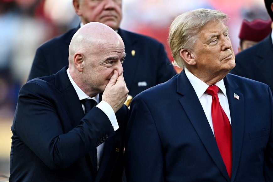 Soccer Football - FIFA World Cup 2026 - Final - Spain v Argentina - New York/New Jersey Stadium, East Rutherford, New Jersey, U.S. - July 19, 2026
U.S. President Donald Trump and FIFA President Gianni Infantino during the trophy presentation after the match REUTERS/Dylan Martinez
