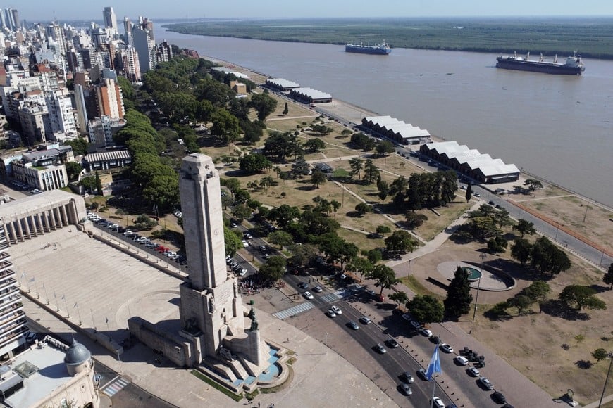 A view shows the Monumento a la Bandera (The National Flag Memorial) as ships sail on the Parana River, in Rosario, Santa Fe province, Argentina March 9, 2023. REUTERS/Agustin Marcarian