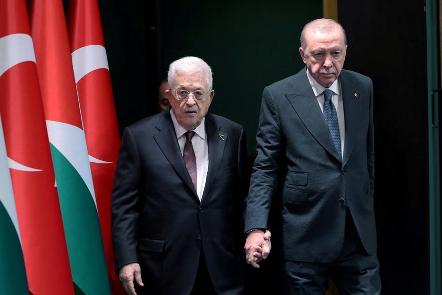 Turkish President Tayyip Erdogan and Palestinian President Mahmoud Abbas arrive for a joint press conference at the presidential palace in Ankara, Turkey, August 12, 2026. Murat Cetinmuhurdar/Turkish Presidential Press Office/Handout via REUTERS ATTENTION EDITORS - THIS PICTURE WAS PROVIDED BY A THIRD PARTY. NO RESALES. NO ARCHIVES.