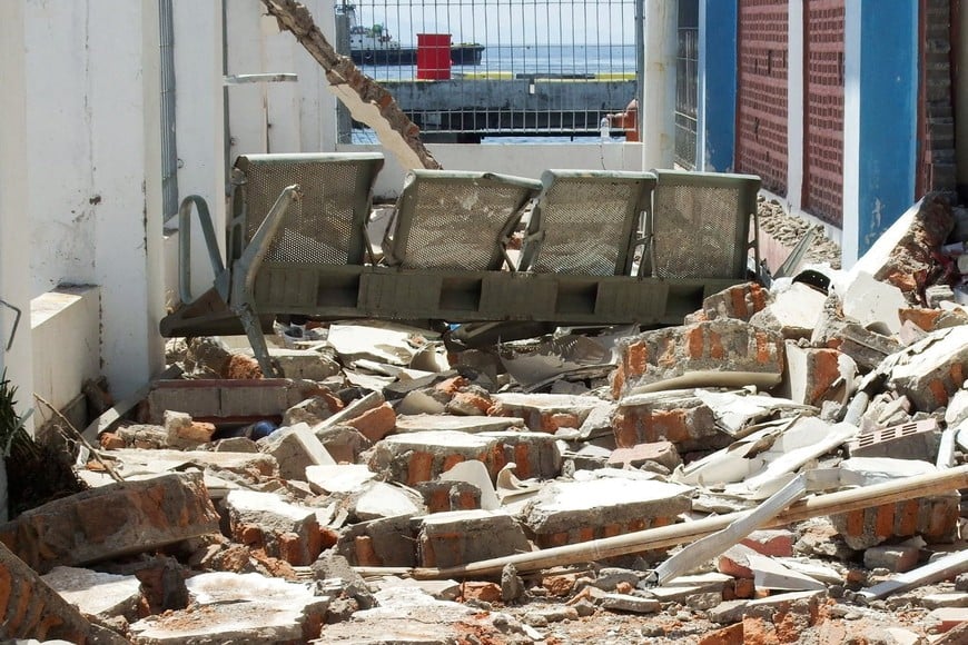 A bench sits among rubble at a heavily-damaged building at L. Say port following an earthquake in Maumere, Sikka, East Nusa Tenggara province, Indonesia, August 15, 2026. REUTERS/Stringer