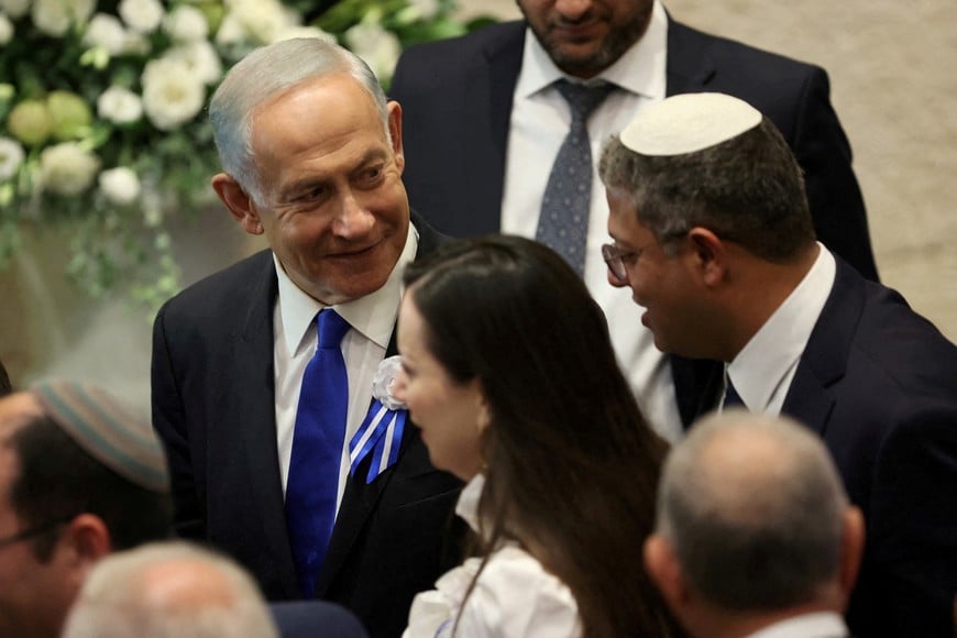 Israeli designate Prime Minister Benjamin Netanyahu and right-wing Knesset member Itamar Ben Gvir during the swearing-in ceremony for the new Israeli parliament the 25th Knesset in Jerusalem, November 15, 2022. Abir Sultan/Pool via REUTERS
REFILE - CORRECTING INFORMATION