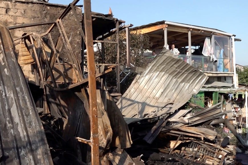 A damaged private house following an overnight attack, what local authorities called a Ukrainian drone strike, in the course of the Russia-Ukraine conflict in Novorossiysk, Russia, in this still image taken from video released on August 12, 2026. Operations Headquarters of Krasnodar Region/Handout via REUTERS ATTENTION EDITORS - THIS IMAGE WAS PROVIDED BY A THIRD PARTY. NO RESALES. NO ARCHIVES. MANDATORY CREDIT