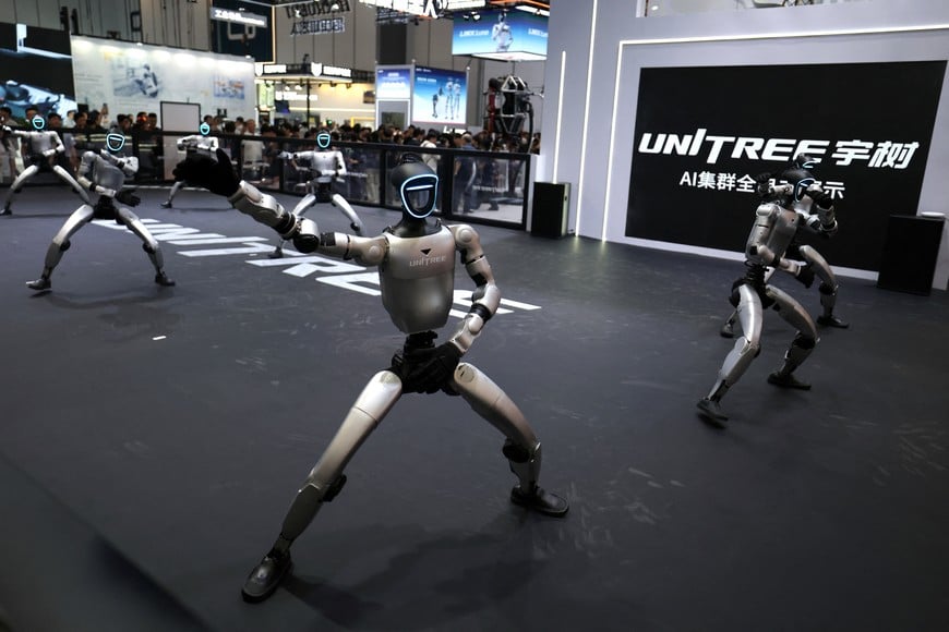 Humanoid robots by Unitree Robotics demonstrate a group dance during the 2026 World Robot Conference, in Beijing, China, August 19, 2026. REUTERSTingshu Wang