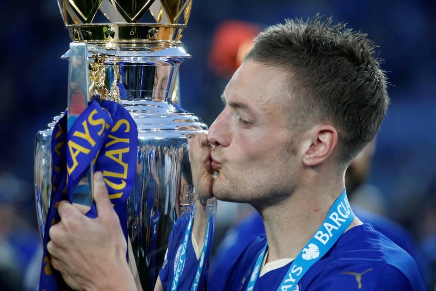 FILE PHOTO: Britain Soccer Football - Leicester City v Everton - Barclays Premier League - King Power Stadium - 7/5/16
Leicester City's Jamie Vardy lifts the trophy as he celebrates winning the Barclays Premier League
Action Images via Reuters / Carl Recine
Livepic
EDITORIAL USE ONLY. No use with unauthorized audio, video, data, fixture lists, club/league logos or "live" services. Online in-match use limited to 45 images, no video emulation. No use in betting, games or single club/league/player publications. Please contact your account representative for further details./File Photo