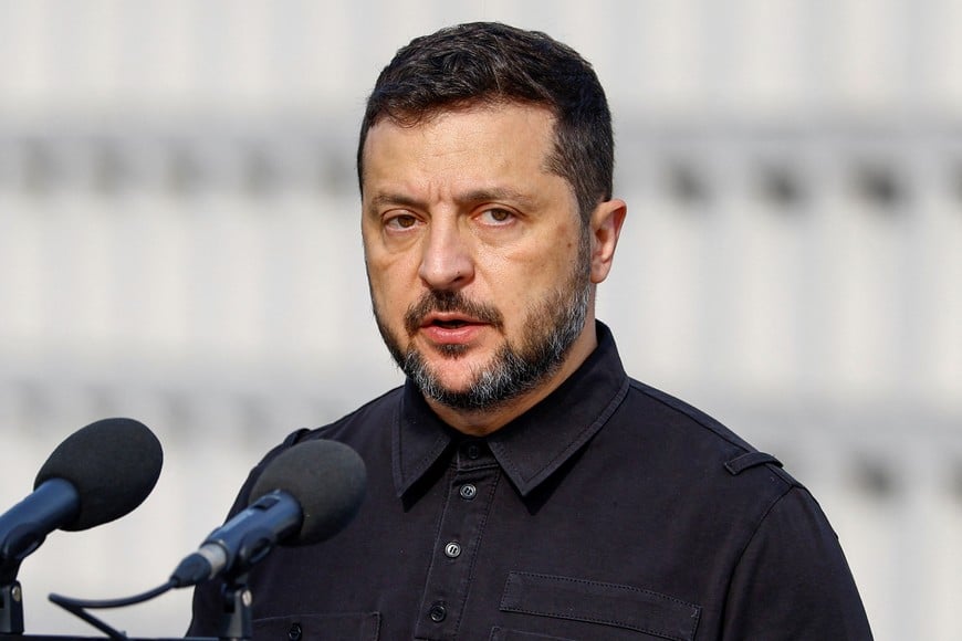 Ukraine's President Volodymyr Zelenskiy delivers a speech during a reburial ceremony for Yevhen Konovalets, one of founders and leaders of the Organisation of Ukrainian Nationalists (OUN), at the National Military Memorial Cemetery outside of Kyiv, Ukraine, August 18, 2026. REUTERS/Valentyn Ogirenko