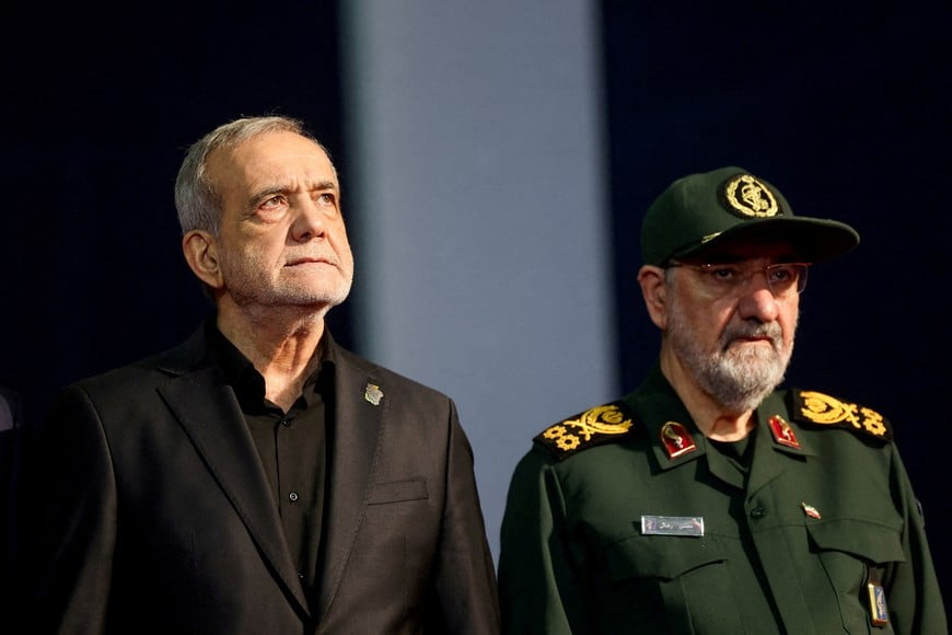 FILE PHOTO: Iranian President Masoud Pezeshkian and adviser to Iran's supreme leader Mohsen Rezaei attend a farewell ceremony for Iran's late Supreme Leader Ayatollah Ali Khamenei, who was killed on February 28 during Israeli and U.S. airstrikes on Iran, for international delegates at the Imam Khomeini Grand Mosalla in Tehran, Iran, July 3, 2026. REUTERS/Mohammed Salem
Foreign media in Iran operate under guidelines set by the Ministry of Culture and Islamic Guidance, which regulates press activity and permissions
ISRAEL OUT. NO COMMERCIAL OR EDITORIAL SALES IN ISRAEL. NO ACCESS FOR ISRAELI MEDIA. NO USE BBC PERSIAN. NO USE VOA PERSIAN. NO USE MANOTO. NO USE IRAN INTERNATIONAL. NO USE RADIO FARDA. DIGITAL: NO USE BBC PERSIAN. NO USE VOA PERSIAN. NO USE MANOTO. NO USE IRAN INTERNATIONAL. NO USE RADIO FARDA./File Photo