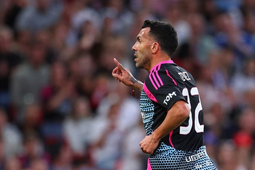 Soccer Football - Soccer Aid charity match for Unicef - Old Trafford, Manchester, Britain - June 15, 2025
Soccer Aid World XI's Carlos Tevez celebrates scoring their second goal Action Images via Reuters/Ed Sykes