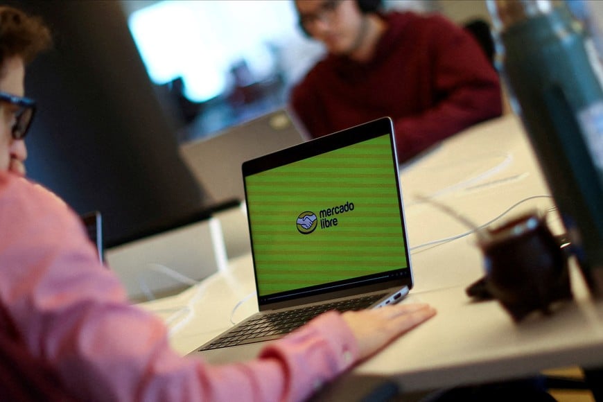 FILE PHOTO: An employee of e-commerce MercadoLibre works at the company's offices in Buenos Aires, Argentina September 6, 2024. REUTERS/Agustin Marcarian/File Photo