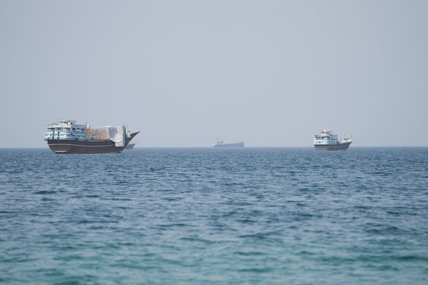 Vessels near the Strait of Hormuz, as seen from Musandam, Oman, August 6, 2026. REUTERS/Stringer