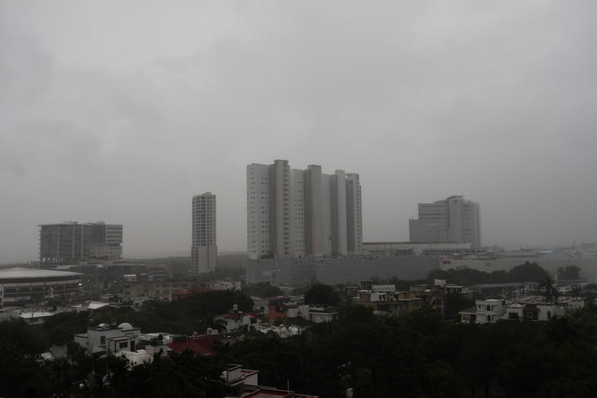 Strong winds and rain are seen hitting building as Hurricane Delta passes through Cancun, in the state of Quintana Roo, Mexico October 7, 2020. REUTERS/Henry Romero