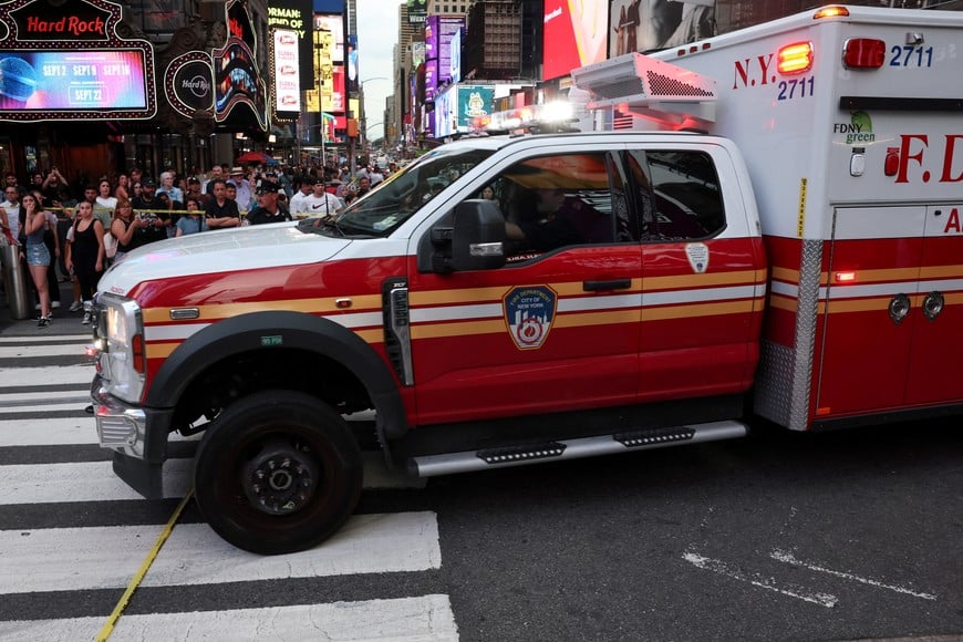An ambulance leaves the scene of an officer-involved shooting, in Times Square, New York City, U.S. August 31, 2026. REUTERS/Brendan McDermid