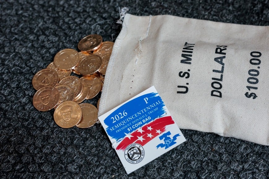 A bag of $1 coins with U.S. President Donald Trump's portrait, in honor of the nation's 250th anniversary of independence, on the day the coin is released for sale, is seen in this illustration taken, September 2, 2026. REUTERS/Kylie Cooper/Illustration