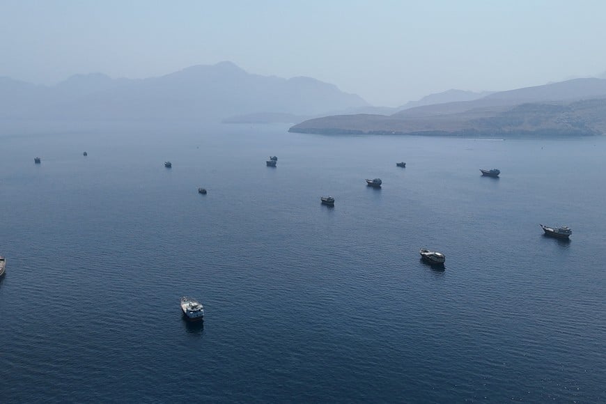 FILE PHOTO: A drone view shows vessels near the Strait of Hormuz, as seen from Musandam, Oman, August 28, 2026. REUTERS/Stringer/File Photo