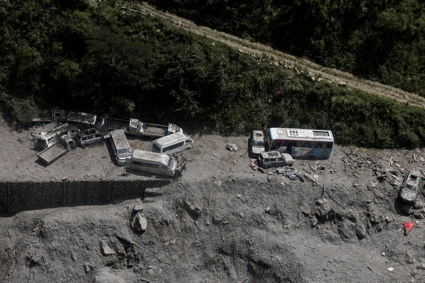 An aerial view shows vehicles lying amid debris at Timure Bazar following the deadly flash floods and mudslides in Rasuwa, Nepal, September 3, 2026. REUTERS/Navesh Chitrakar TPX IMAGES OF THE DAY