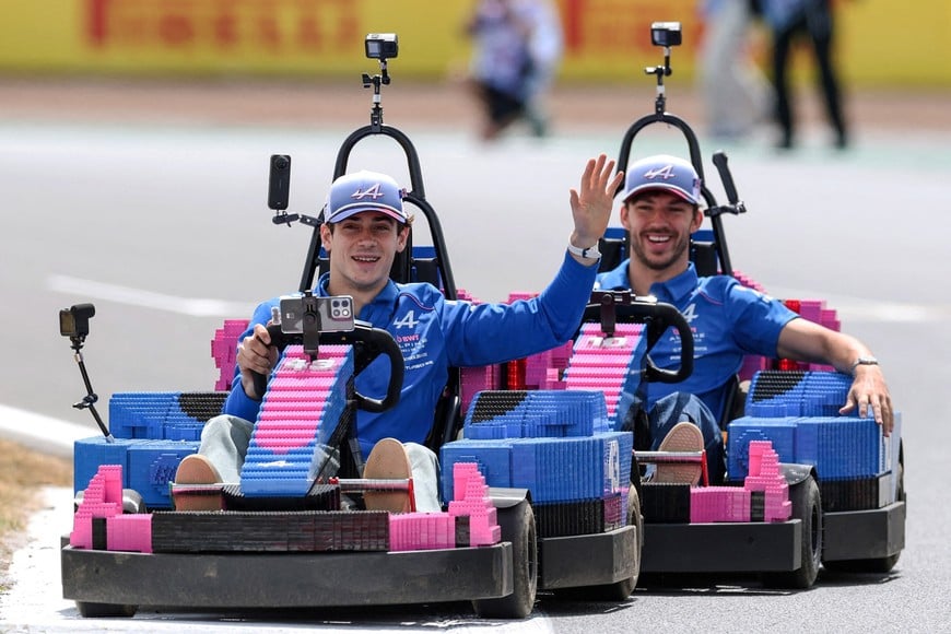 FILE PHOTO: Formula One F1 - British Grand Prix - Silverstone Circuit, Silverstone, Britain - July 5, 2026
Alpine's Franco Colapinto and Alpine's Pierre Gasly in cars made of Lego blocks ahead of the race REUTERS/Andrew Boyers/File Photo