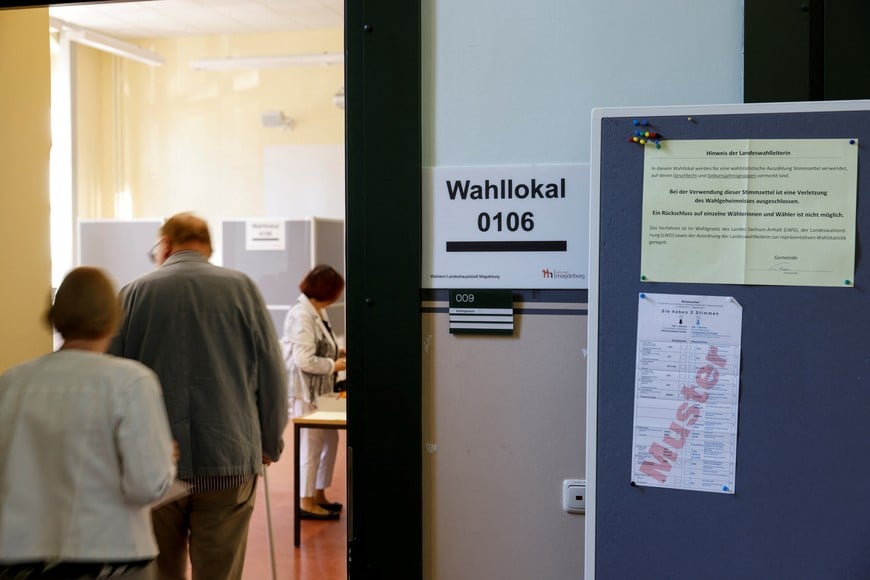 People vote in the Saxony-Anhalt state elections at a polling station in Magdeburg, Germany, September 6, 2026. REUTERS/Axel Schmidt