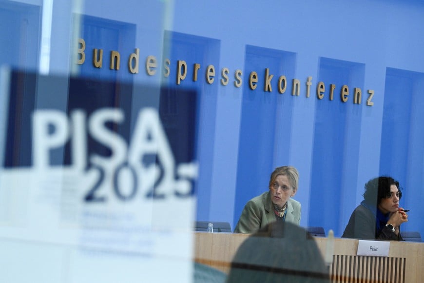 German Family Minister Karin Prien presents the 2026 PISA (Programme for International Student Assessment) report issued by the Organisation for Economic Co-operation and Development (OECD) in Berlin, Germany, September 8, 2026. Picture taken through glass. REUTERS/Annegret Hilse