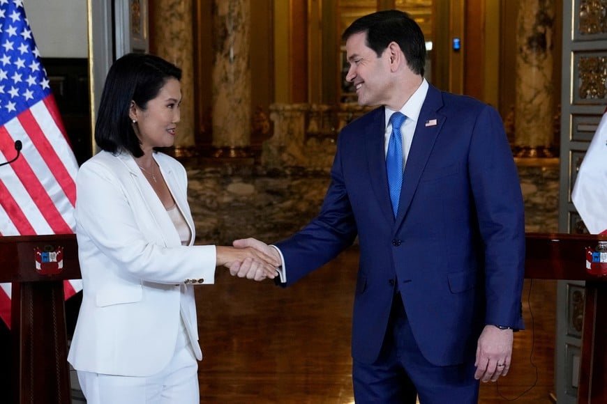 U.S. Secretary of State Marco Rubio and Peruvian President Keiko Fujimori shake hands after a joint news conference at the presidential palace in Lima, Peru, September 10, 2026.     Martin Mejia/Pool via REUTERS