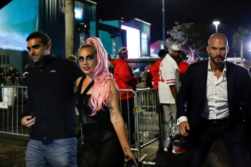 NFL Football - Super Bowl LIV - Kansas City Chiefs v San Francisco 49ers - Hard Rock Stadium, Miami Gardens, Florida, U.S. - February 2, 2020. Lady Gaga and Michael Polansky leave after the game. REUTERS/Marco Bello