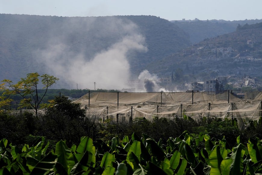 Smoke rises in Mansouri following Israeli strike as seen from the coastal road to Naqoura, Lebanon, September 11, 2026. REUTERS/Raghed Waked