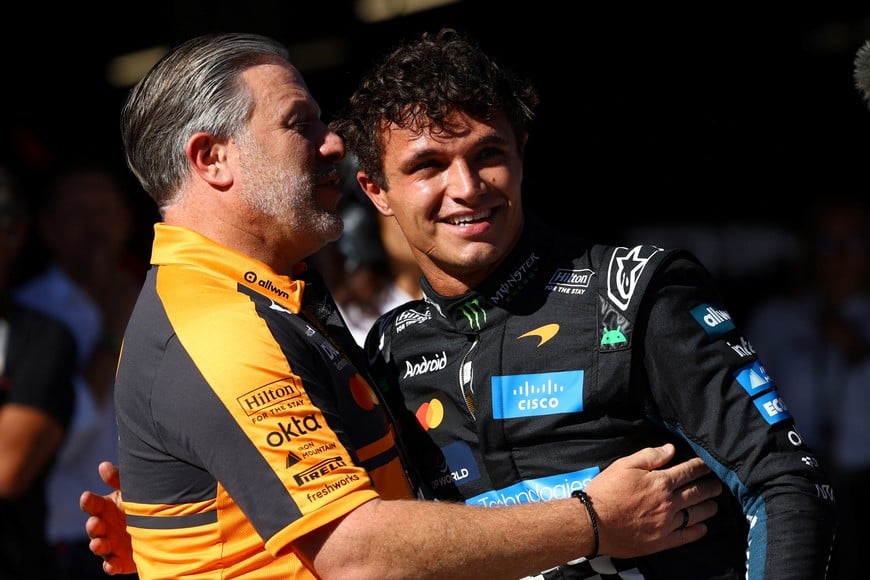 Formula One F1 - Spanish Grand Prix - Madring, Madrid, Spain - September 12, 2026
McLaren's Lando Norris celebrates with McLaren chief executive Zak Brown after finishing in pole position during qualifying REUTERS/Albert Gea