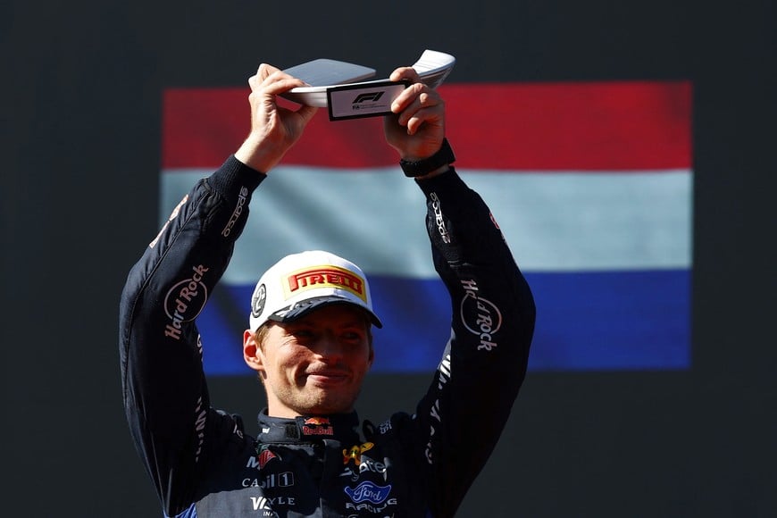 Formula One F1 - Spanish Grand Prix - Madring, Madrid, Spain - September 13, 2026
Red Bull's Max Verstappen celebrates on the podium after finishing second in the Spanish Grand Prix REUTERS/Albert Gea
