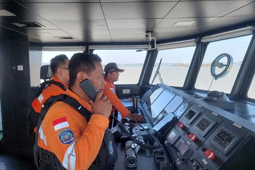 Rescuers work during a search operation after the Virgo Transport 8 ferry sank while sailing from Surabaya to Banjarmasin, in the Java Sea, Indonesia, September 13, 2026. Indonesia's National Search and Rescue Agency (BASARNAS)/Handout via REUTERS THIS IMAGE HAS BEEN SUPPLIED BY A THIRD PARTY. MANDATORY CREDIT. NO RESALES. NO ARCHIVES REFILE - CHANGING FROM "VIRGO TRANSPORT 8 SHIP" TO "VIRGO TRANSPORT 8 FERRY".