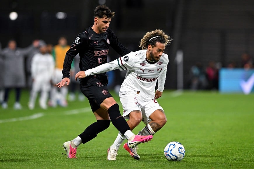 Soccer Football - Copa Libertadores - Quarter Final - Second Leg - Platense v Fluminense - Estadio Ciudad de Vicente Lopez, Buenos Aires, Argentina - September 15, 2026
Fluminense's Guga in action with Platense's Martin Barrios REUTERS/Rodrigo Valle