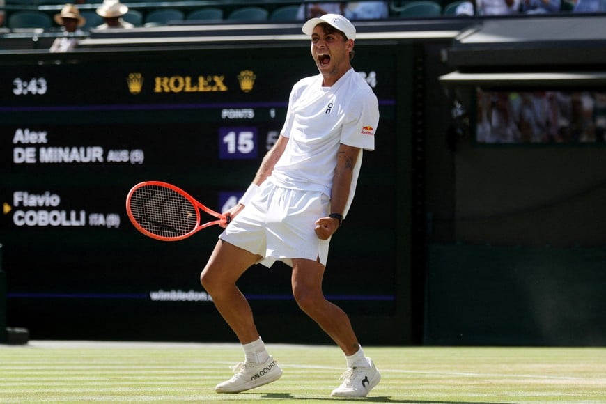 Tennis - Wimbledon - All England Lawn Tennis and Croquet Club, London, Britain - July 6, 2026
Italy's Flavio Cobolli celebrates after winning his fourth round match against Australia's Alex de Minaur REUTERS/Marko Djurica TPX IMAGES OF THE DAY