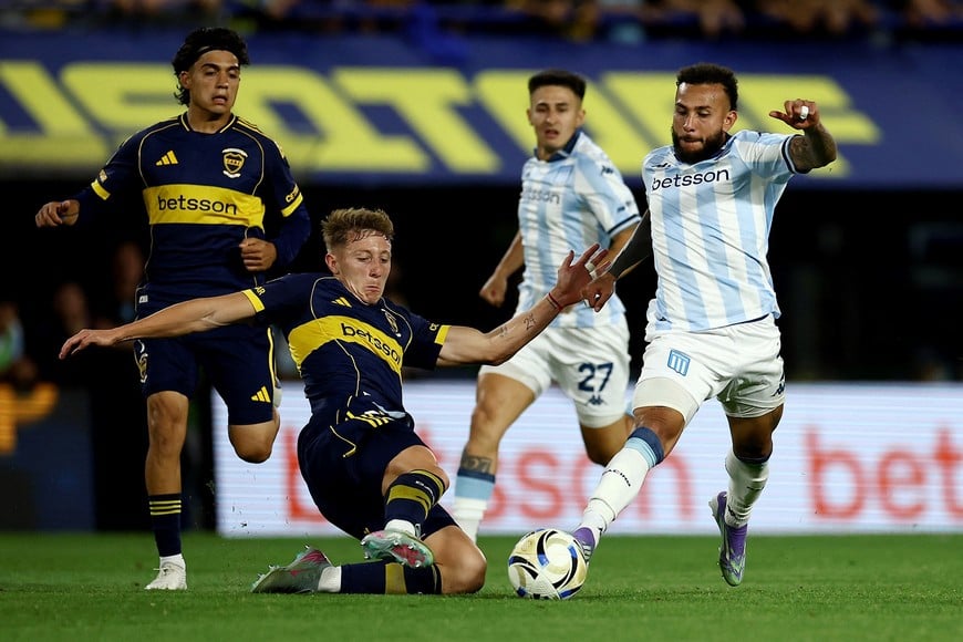 Soccer - Argentina - Argentine Primera Division - Torneo Clausura - Boca Juniors v Racing Club - Estadio La Bombonera, Buenos Aires, Argentina - December 7, 2025
Boca Juniors' Juan Barinaga in action with Racing Club's Duvan Vergara REUTERS/Agustin Marcarian