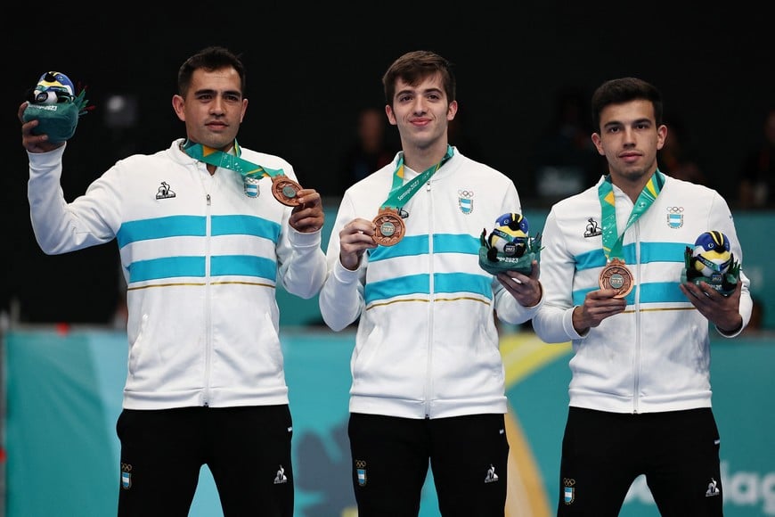 Pan-Am Games - Santiago 2023 - Table tennis - Centro de Entrenamiento Olimpico, Santiago, Chile - November 5, 2023
Bronze medalists Gaston Alto, Santiago Lorenzo, Horacio Cifuentes of Argentina during the medals ceremony for the men's team event REUTERS/Luisa Gonzalez