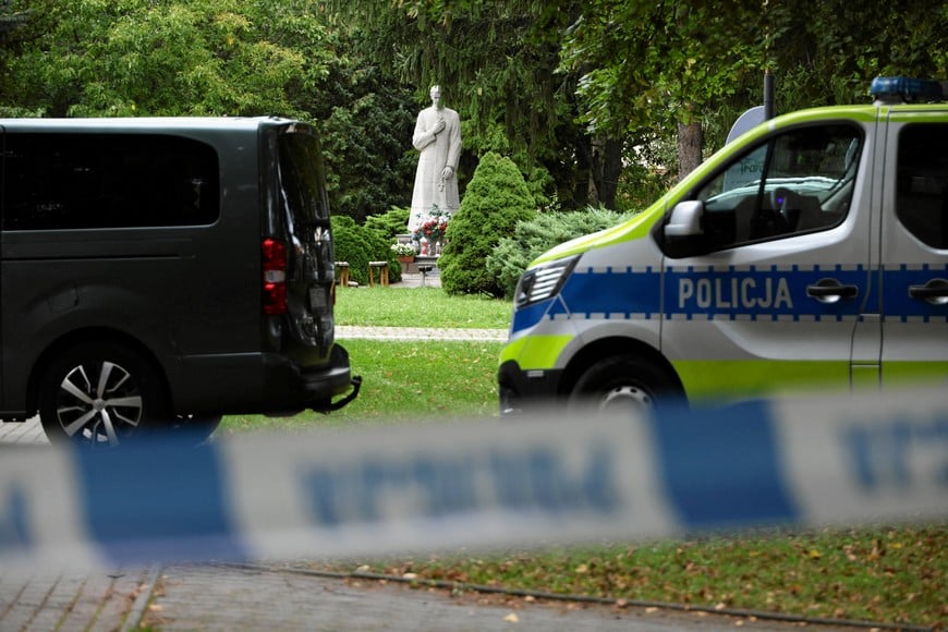 A police vehicle stands near the site of a knife attack on the grounds of a Benedictine Sisters monastery that, as per local media, caused multiple casualties, in Jaroslaw, Poland, September 24, 2026. Fot. Patryk Ogorzalek/via REUTERS ATTENTION EDITORS - THIS IMAGE WAS PROVIDED BY A THIRD PARTY. POLAND OUT. NO COMMERCIAL OR EDITORIAL SALES IN POLAND.