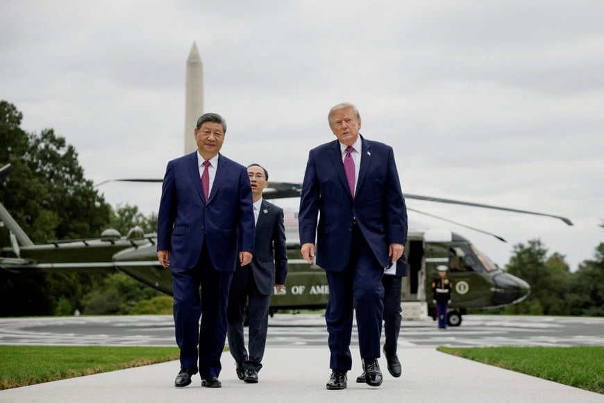 US President Donald Trump and Chinese President Xi Jinping walk back to the White House in Washington, D.C., US, September 24, 2026. REUTERS/Evan Vucci TPX IMAGES OF THE DAY