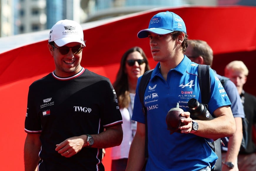 Formula One F1 - Azerbaijan Grand Prix - Baku City Circuit, Baku, Azerbaijan - September 24, 2026
Cadillac's Sergio Perez and Alpine's Franco Colapinto arrive ahead of practice REUTERS/Jakub Porzycki