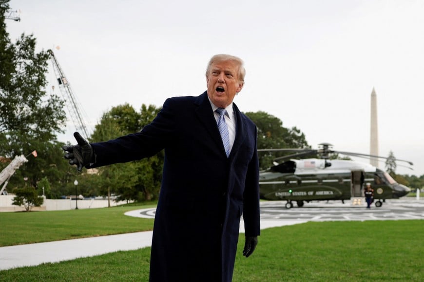 US President Donald Trump speaks to the media as he returns to the White House after greeting Chinese President Xi Jinping at Joint Base Andrews, on the South Lawn of the White House in Washington, DC, US, September 23, 2026. REUTERS/Evan Vucci